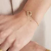 FRENCH RIVIERA | Lucky Clover -kirurginteräsrannekoru (kulta)
