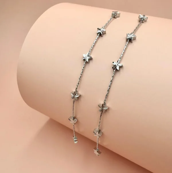 FRENCH RIVIERA | Étoile Earrings -pitkät tähtikorvakorut (hopea)