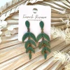 FRENCH RIVIERA | Feather -boheemit antiikkikupari sulkakorvakorut